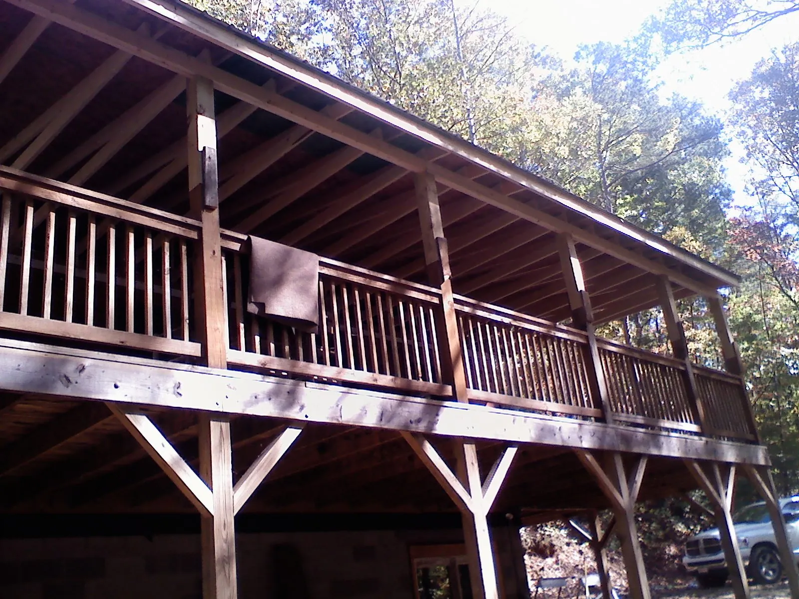 Timber framing under a new elevated porch and deck — Roof Leak Repair in North Powder by Roofing Brothers
